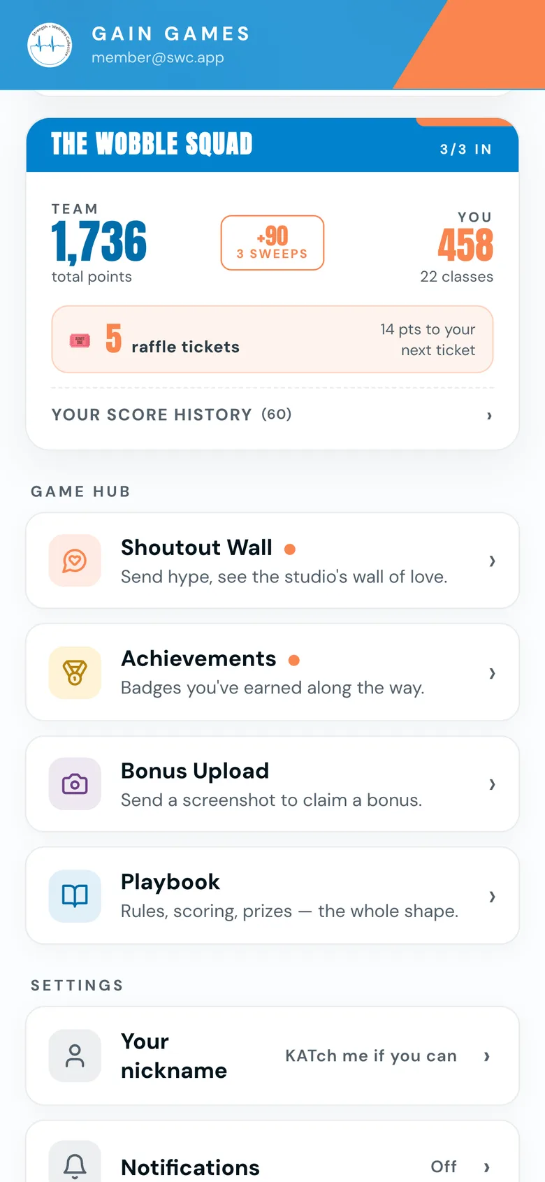 App scorecard — team total, your points, sweeps and raffle tickets, Game Hub below